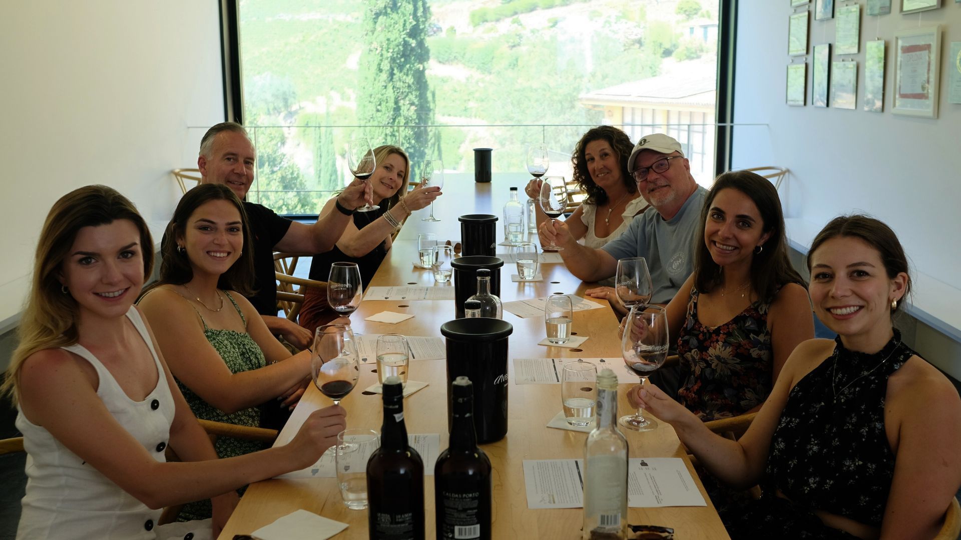 Image of a group enjoying a port wine tasting after the winery visit on Cooltour Oporto's Douro Valley Wine Tour from Porto