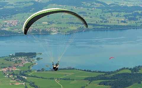 Paragliding Adventure Over Phewa Lake in Pokhara, Nepal