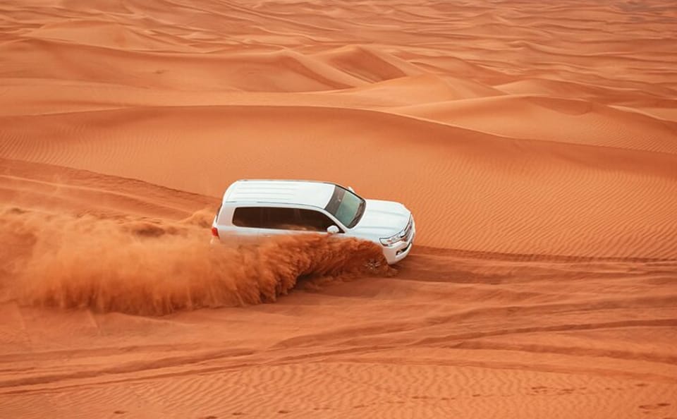 Red Dunes Morning Safari: Dune Bashing, Camel Ride & Quad Biking