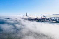 Dublin City above the clouds as you fly into Dublin over the sea these towers are visible from the left side of your Aircraft as you fly in over the sea