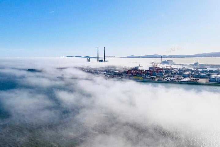 Dublin City above the clouds as you fly into Dublin over the sea these towers are visible from the left side of your Aircraft as you fly in over the sea