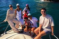 Charter a luxury yacht for a relaxing day exploring the stunning Cabo coastline with friends and family.
