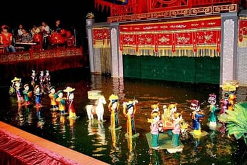 Water Puppet Show with Cyclo Ride and Dinner Cruise in Ho Chi Minh City