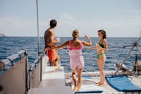 Set sail on a Los Cabos private catamaran! Snorkel in crystal-clear waters and sip cocktails from the open bar as you soak up the sun.