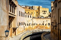Historic ramparts and alleys of the Medina of Fez, along the Wadi, illustrating the traditional architecture and urban fabric of one of the imperial cities classified by UNESCO.