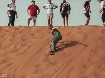 Desert Buggy Adventure with Camel Ride and Sandboarding in Sharjah