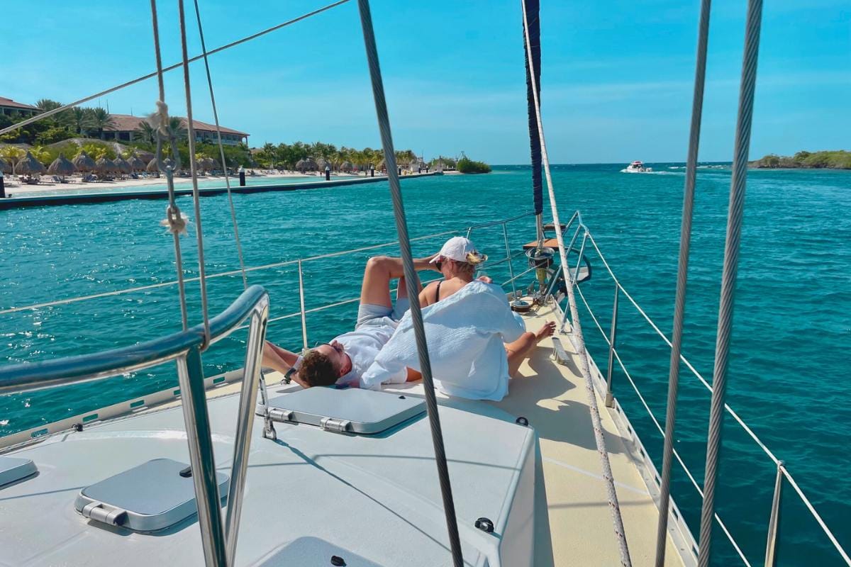 couple enjoying relaxing on sailing yacht galaxie