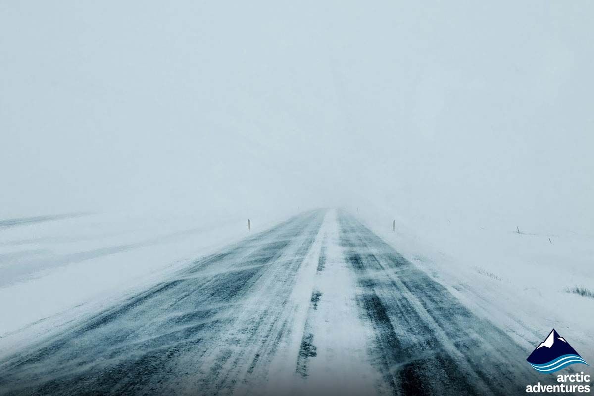 Snow storm during during day south coast tour Iceland