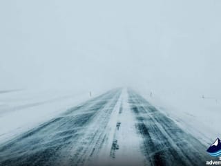 Snow storm during during day south coast tour Iceland