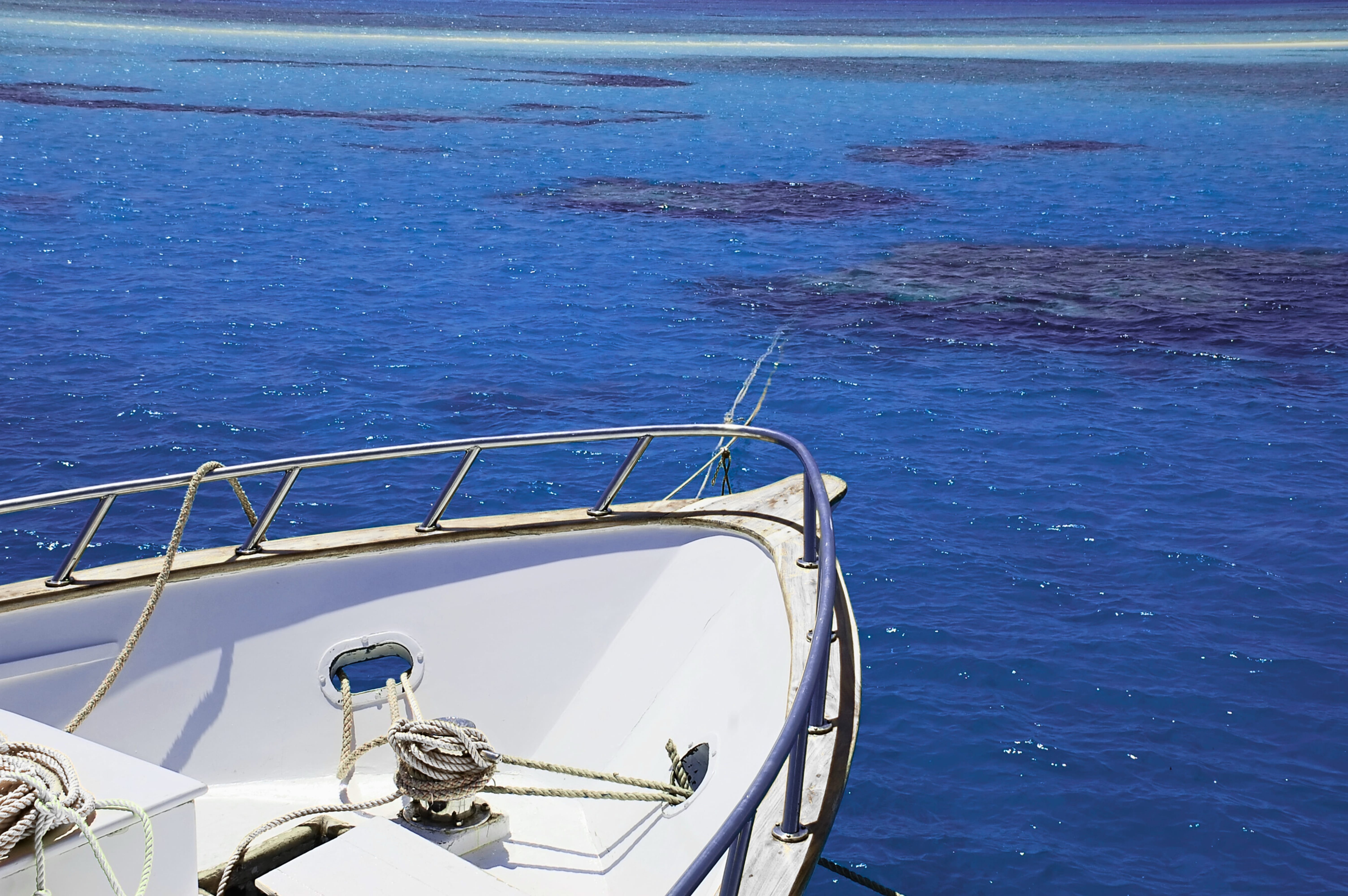 Crystal clear waters awaiting your next dive near Tiran Island in Sharm El Sheikh.