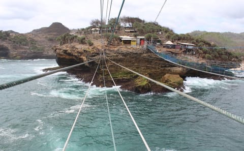 Caving Adventure at Jomblang Cave and Gondola Beach Tour