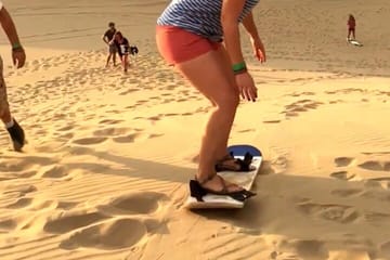 Morning Desert Safari with Camel Farm and Sandboarding in Dubai