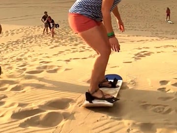 Morning Desert Safari with Camel Farm Visit & Sandboarding