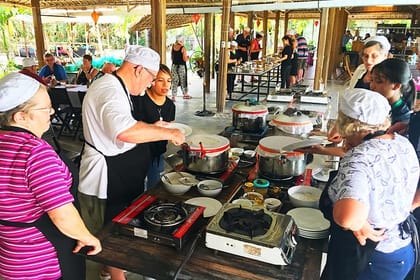 Traditional Cooking Class with Basket Boat Ride and market Tour