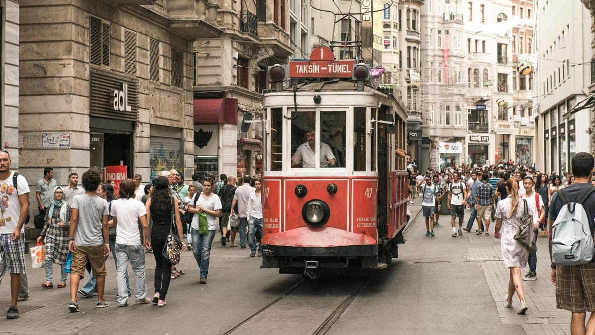 Classic Istanbul street scene — the famous red tram rolling through the city’s heart.