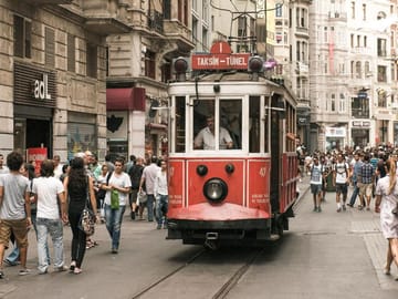 Classic Istanbul street scene — the famous red tram rolling through the city’s heart.