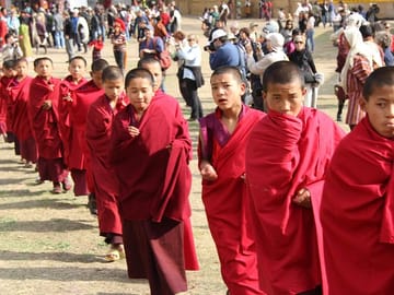 Young Buddhist monks at one of the festivals in western Bhutan.