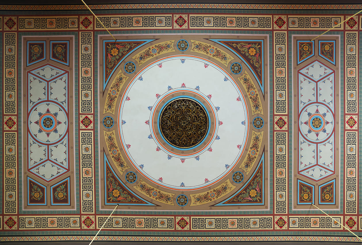 Ornate neoclassical ceiling of live classical concert Vienna hall with geometric patterns from 1837