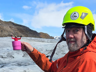 Playing with illusion on the glacier, "little man - big man".