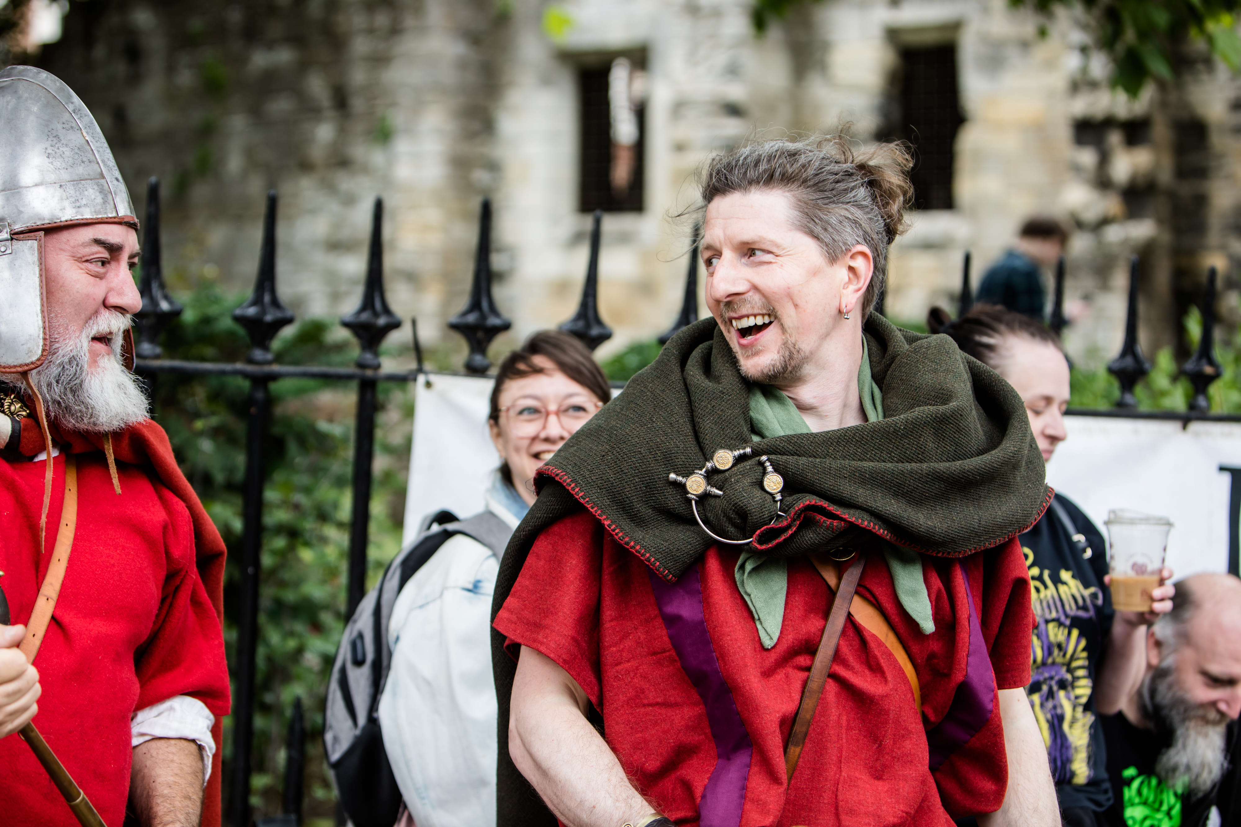 Two splendid Romans share a laugh on Museum Street before the start of the tour. Whatever was said the guests are laughing also.