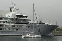 No Limits passing one of the many impressive Super Yachts