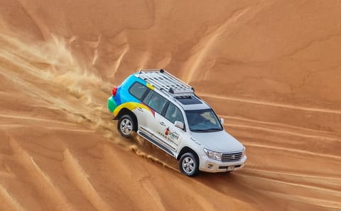 Premium Dubai Desert Safari with ATV Ride and BBQ Dinner