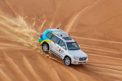 Premium Dubai Desert Safari with BBQ Dinner in the Red Dunes