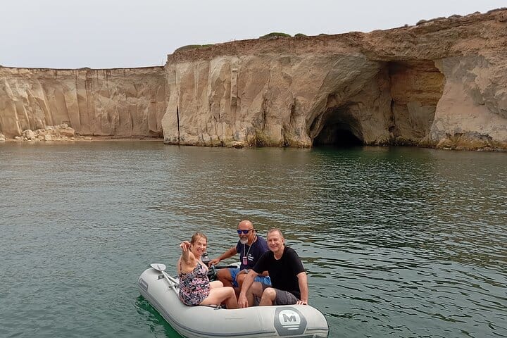 Guests on a RIB boat exploring Plemmirio Marine Reserve, Sicily