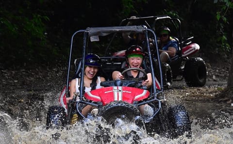 Roatan Jungle ATV Tour with Sloth Interaction and Beach Stop