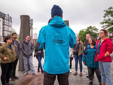 Our guide introducing themselves to a group of travellers