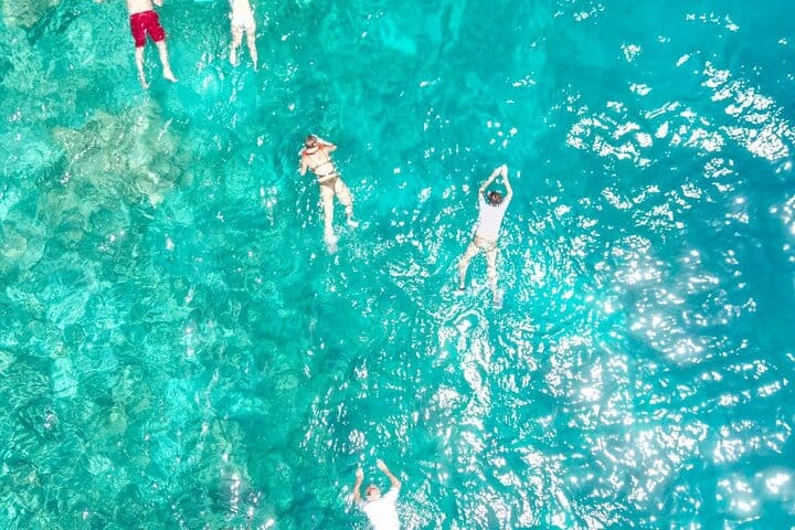 A refreshing snorkeling session in calm, shallow water with excellent visibility.