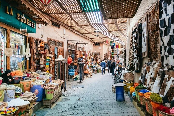 A glimpse into the Marrakech Medina tour, where you can touch handwoven fabrics, taste local spices, and meet artists who make the soul of the souks of Marrakech.