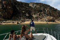 Enjoy stunning beach views as you anchor your private yacht in a secluded cove.