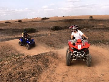 Marrakech Desert Delights: Quad Biking, Camel Ride, Dinner Show