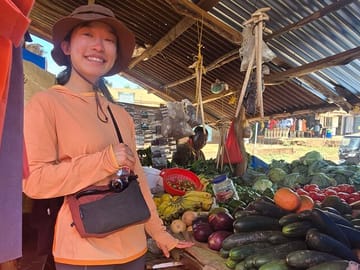 Exploring the local markets for a taste of authentic Tanzanian flavors and culture.
