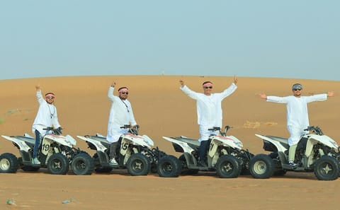 Red Dunes Morning Safari: Dune Bashing, Camel Ride & Quad Biking