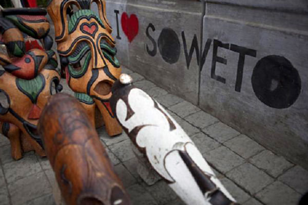 Vibrant Soweto art and the iconic 'I ♥ Soweto' sign encapsulate the spirit of the township.