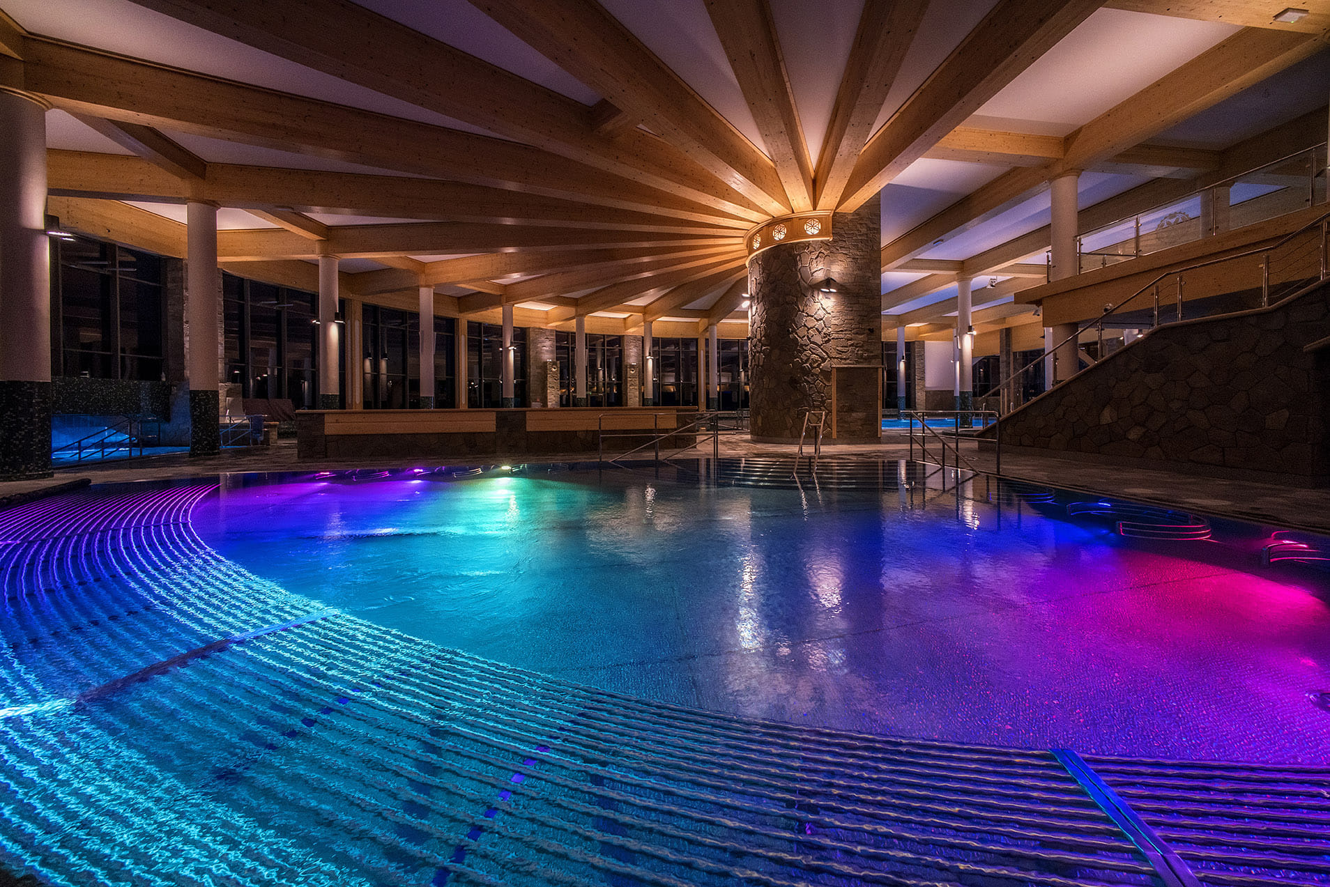 Chochołów Thermal Baths indoor pool night lighting — mineral water pools wooden architecture Podhale