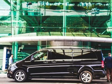 Minivan at Airport Terminal