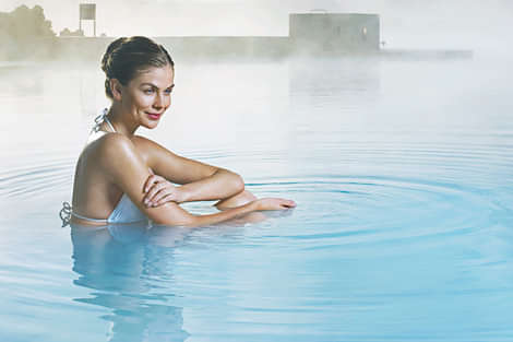Woman relaxing in the Blue Lagoon in Iceland