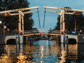 Photoshoot Walking Tour at Magere Brug in Amsterdam