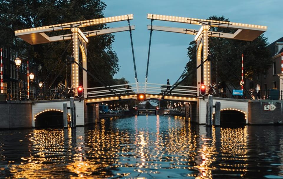 Photoshoot Walking Tour at Magere Brug in Amsterdam