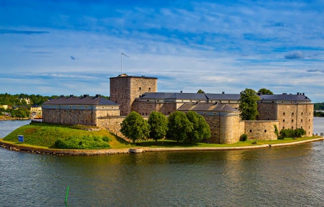 the historic Vaxholm Fortress, which dates back to the 16th century.by Emo Tours Sweden.