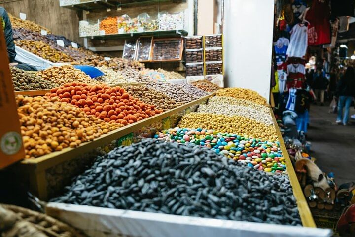 Moroccan Tea and Night Views of Jemaa el-Fna End your tour with warm hospitality, sipping Moroccan tea while overlooking the lively Jemaa el-Fna night market.
