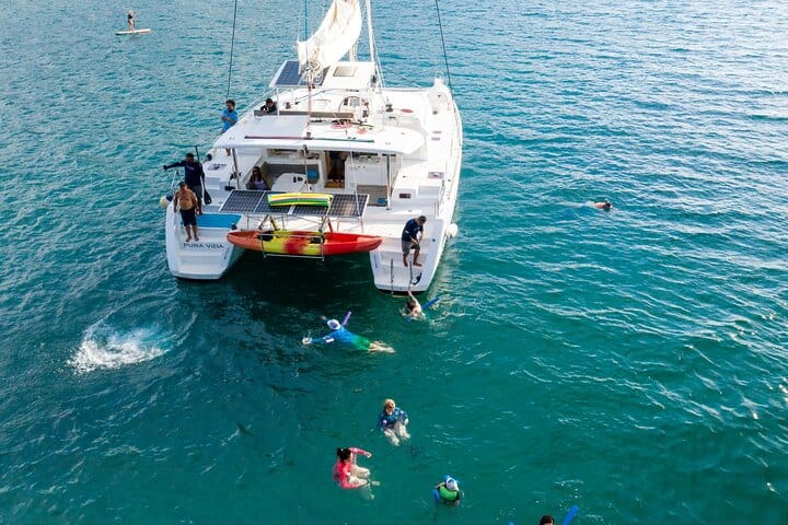 Live the "Pura Vida" as you jump into the turquoise sea for private morning snorkeling and swimming directly from your luxury catamaran deck!