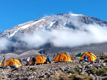 Camping under the clouds on the slopes of Mount Kilimanjaro.