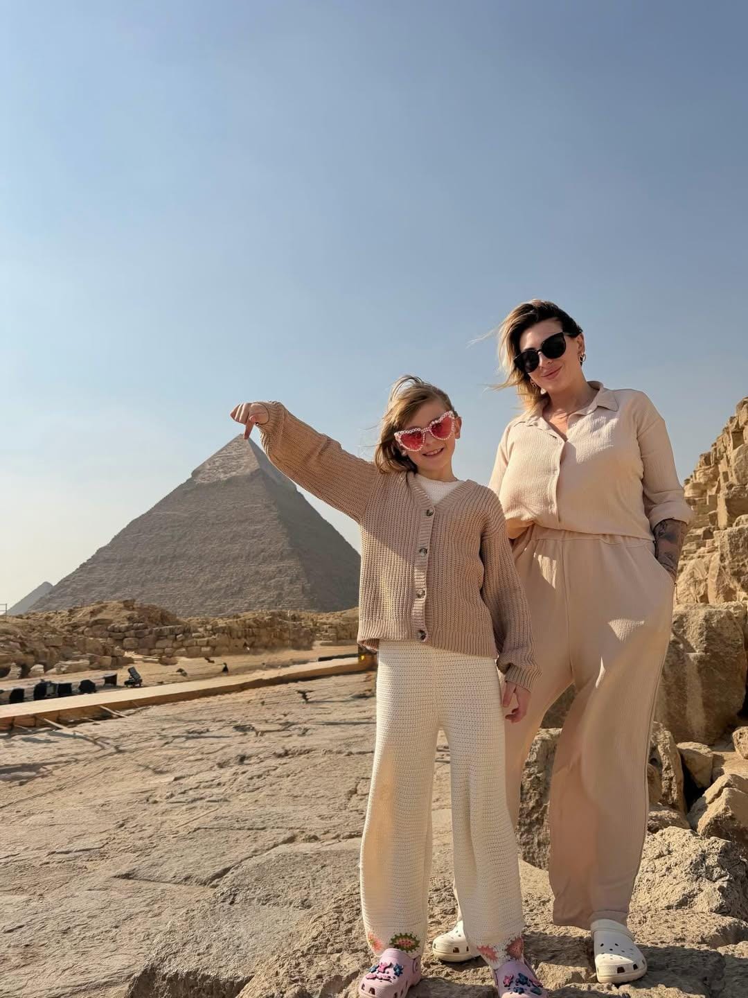 Family photo in front of Khafre pyramid on a Cairo cultural heritage tour.