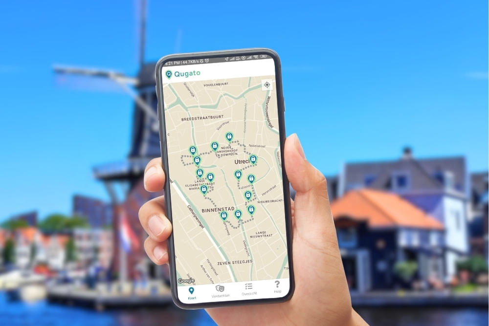 Phone showing the Qugato app interface of the Haarlem City Detective game.