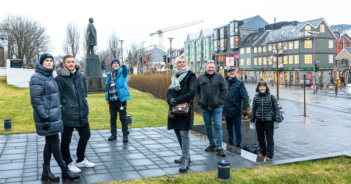A group of guests walking through downtown Reykjavik