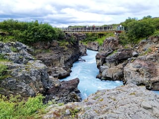 Westisland - 6stündige deutschsprachiger Landausflug - Wasserfälle Hraunfossar, Heißwasserquelle Deildartunguhver & Krater Grábrók, photo 6
